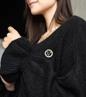 Gemre Black oversized sweater with ruched sleeves Najeta