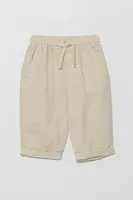 Dětské plátěné kalhoty United Colors of Benetton