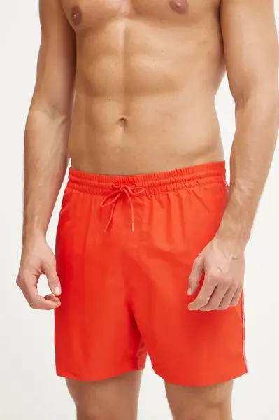 Plavkové šortky Calvin Klein červená barva, KM0KM01109