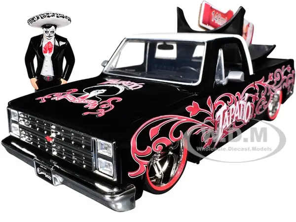 1985 Chevrolet C-10 Pickup Truck Black with White Top and Graphics with Charro Man Diecast Figure "Tapatio" 1/24 Diecast Model Car by Jada