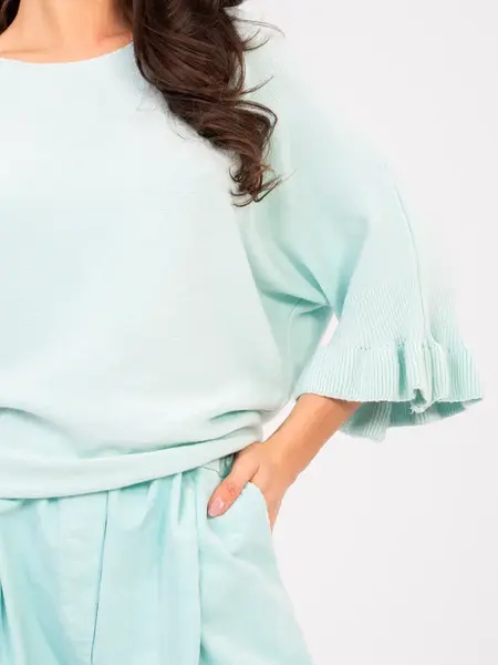 Světle modrý svetr