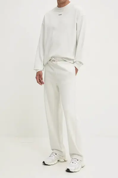 Bavlněné tepláky HUGO Dumrulo béžová barva, s potiskem, 50529110