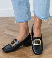 Gemre Black women's low-heeled shoes with a gold decoration Mareda