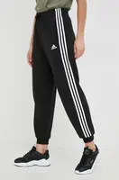 Bavlněné tepláky adidas černá barva, s aplikací