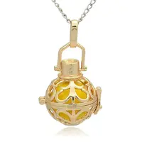 Golden Tone Brass Hollow Round Cage Pendants