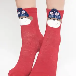 Socks with application monkey in a hat with red stars