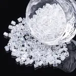 Two Cut Glass Seed Beads