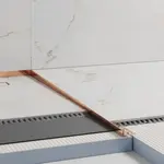 Spádový profil "T" Eviso bronze lesk, nerez PVD, dĺžka 120 cm, výška hrany 11 mm, LSBR0101