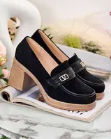 Resti Women's moccasins on a post Lemaneg