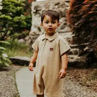 Dětské bavlněné dupačky Donsje Adriaen Playsuit Red Panda