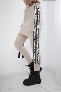 Pants/suit with beige selfie lettering