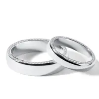 Svadobná súprava z bieleho zlata s diamantmi po stranách obrúčky KLENOTA