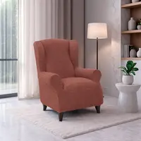 Super strečové poťahy RUBINIA tehlová kreslo ušiak (š. 70 - 95 cm)