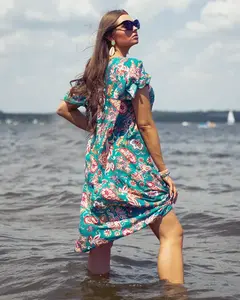 Resti Green women's dress with colorful floral pattern