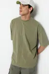 Trendyol Pánske basic oversize/wide cut crew krátke rukávy 1 bavlnené tričko s obnoseným/vyblednutým efektom.