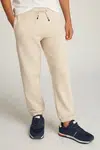 Dětské tepláky Tommy Hilfiger béžová barva, hladké, KS0KS00596