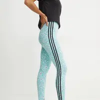 Legíny adidas Animal dámské, tyrkysová barva, vzorované, IY5008