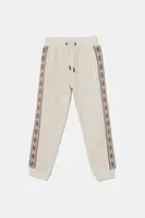 Detské tepláky Guess béžová farba, vzorované, L5GQ13 KB3P2