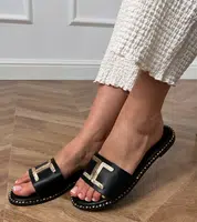 Gemre Black flip-flops with a gold decoration on the strap Verona
