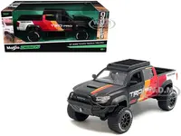 2023 Toyota Tacoma TRD PRO Off Road Pickup Truck Matt Black with Graphics and Roofrack "Maisto Design" Series 1/27 Diecast Model Car by Maisto