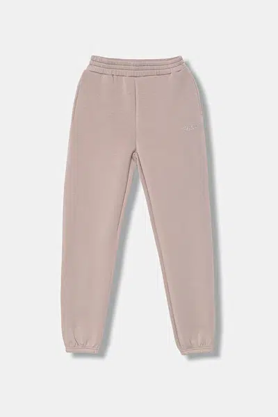 Dětské tepláky Guess béžová barva, J5YQ27 K7UW2