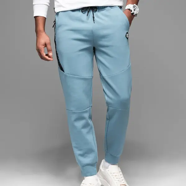 Ombre Men's sweatpants with ribbed cuffs and decorative zipper - light blue