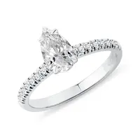 Prsten z bílého zlata s 0,7ct diamantem kapka a brilianty KLENOTA