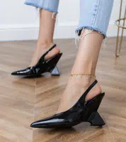 Gemre Black sandals on a geometric wedge Kokkes
