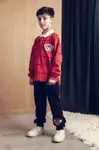 Mini Rodini Detské bavlnené tepláky Mini Rodini E.T.