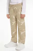 Dětské bavlněné tepláky Calvin Klein Jeans TERRY JOGGER béžová barva, IB0IB02124