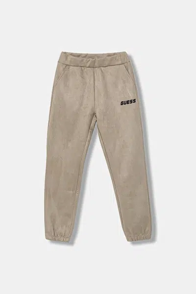 Dětské tepláky Guess béžová barva, L5YQ18 KCJY2