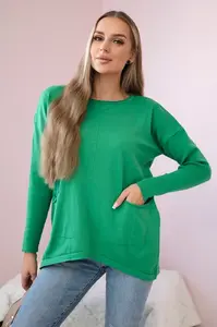 Svetr s předními kapsami světle zelené barvy
