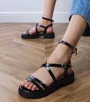 Gemre Black platform sandals with Lagos straps