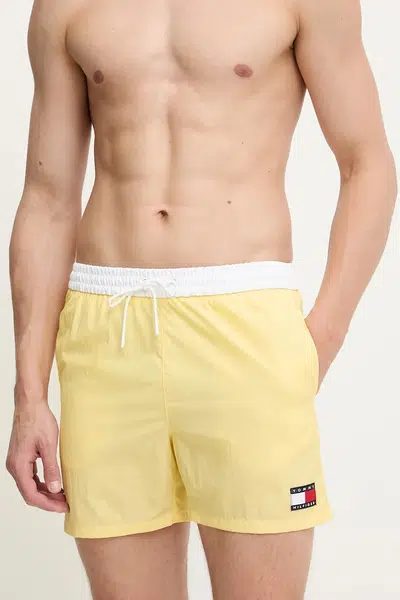 Plavkové šortky Tommy Hilfiger žlutá barva, UM0UM03455