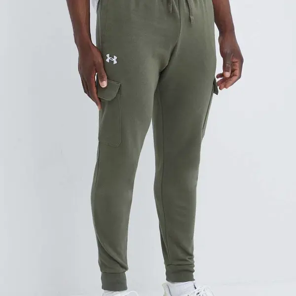 Tepláky Under Armour zelená barva, hladké
