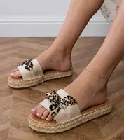 Gemre White espadrille slides with a bow Kartis