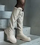 Gemre Beige eco leather flat heel boots decorated with a zipper Hala