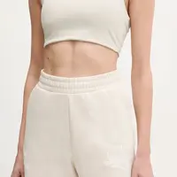 Kraťasy Puma dámské, béžová barva, s aplikací, high waist, 684984