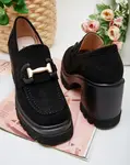 Resti Women's moccasins on a post Tivili