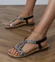 marka niezdefiniowana Black sandals with rhinestones on the straps and edges Revita