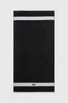 Středně velký bavlněný ručník Lacoste L Casual Bitume 70 x 140 cm