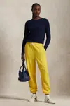 Bavlněné tepláky Polo Ralph Lauren žlutá barva, 211935585