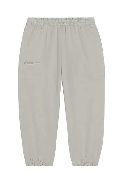 Kalhoty Pangaia KIDS' 365 MIDWEIGHT TRACK PANTS béžová barva, 10000280