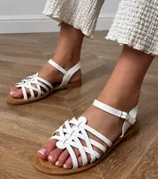 Gemre White woven sandals on a flat sole Selvira
