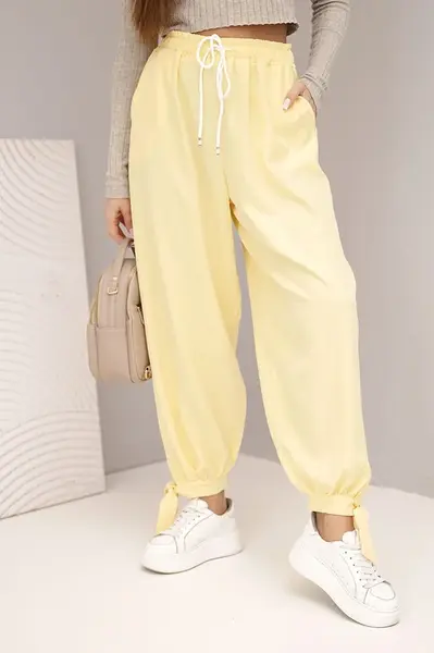 Kesi Włoski Dámské kalhoty s širokým nohavicím a zavazováním dole žluté