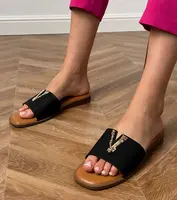 marka niezdefiniowana Black flip-flops with a gold decoration Flavis