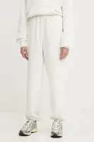 Tepláky Karl Kani béžová barva, hladké, 61030031