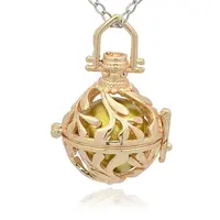 Golden Tone Brass Hollow Round Cage Pendants