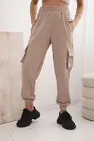 Dámské béžové cargo kalhoty s kapsami a řetízkem