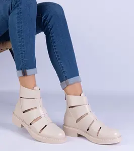Gemre Beige faux leather ankle boots with cutouts on a flat heel Kalipso